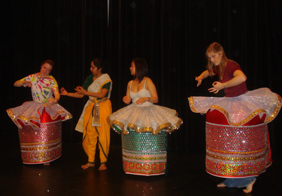 Sohini Ray teaches students dance in traditional Manipuri costume